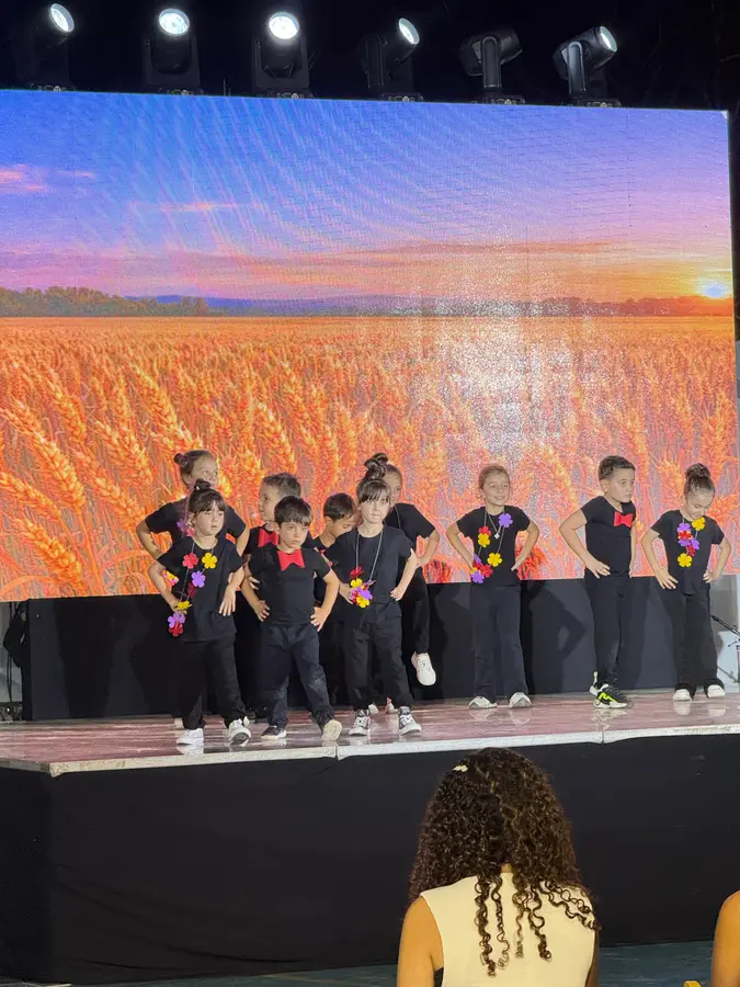 Students performing on stage